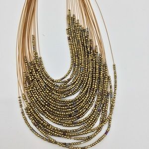 Beaded Gold necklace NWT , costume jewelry